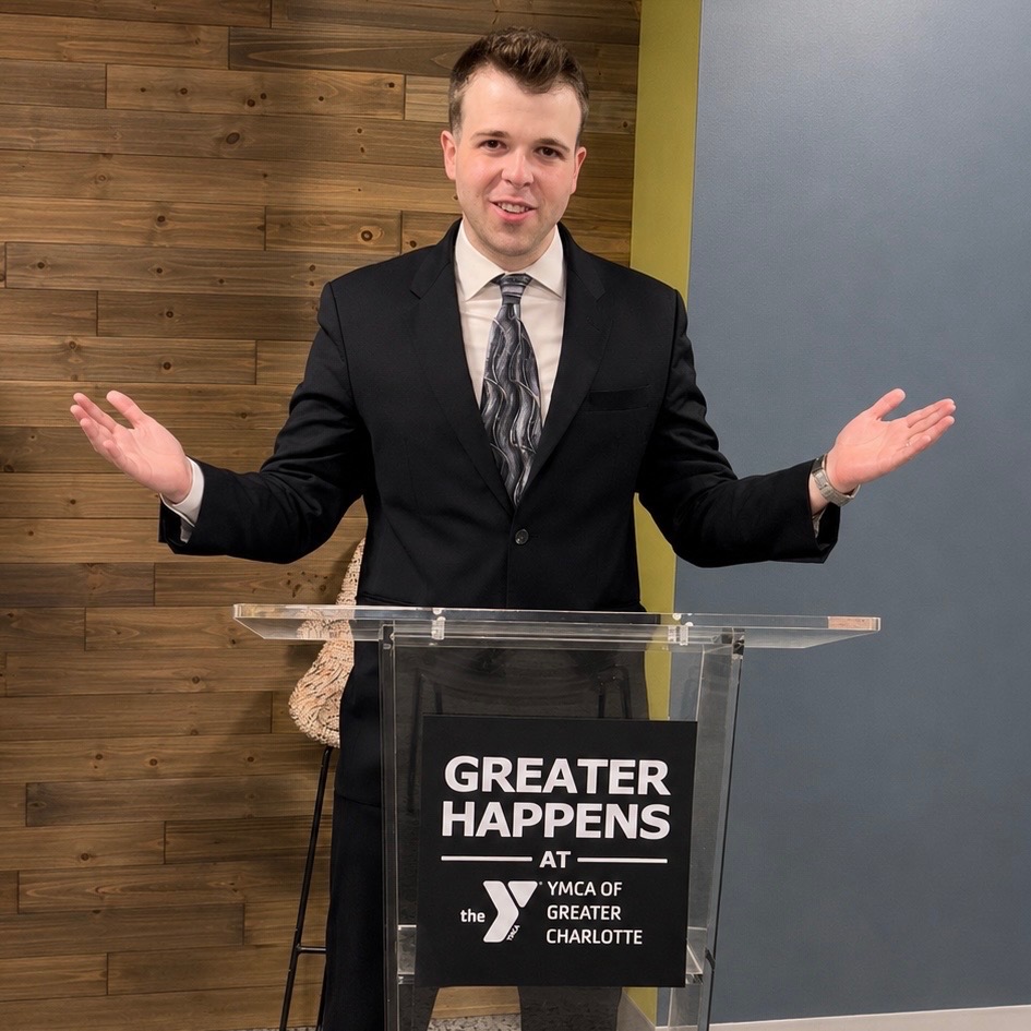 JD Hopper speaking at the YMCA of Greater Charlotte podium